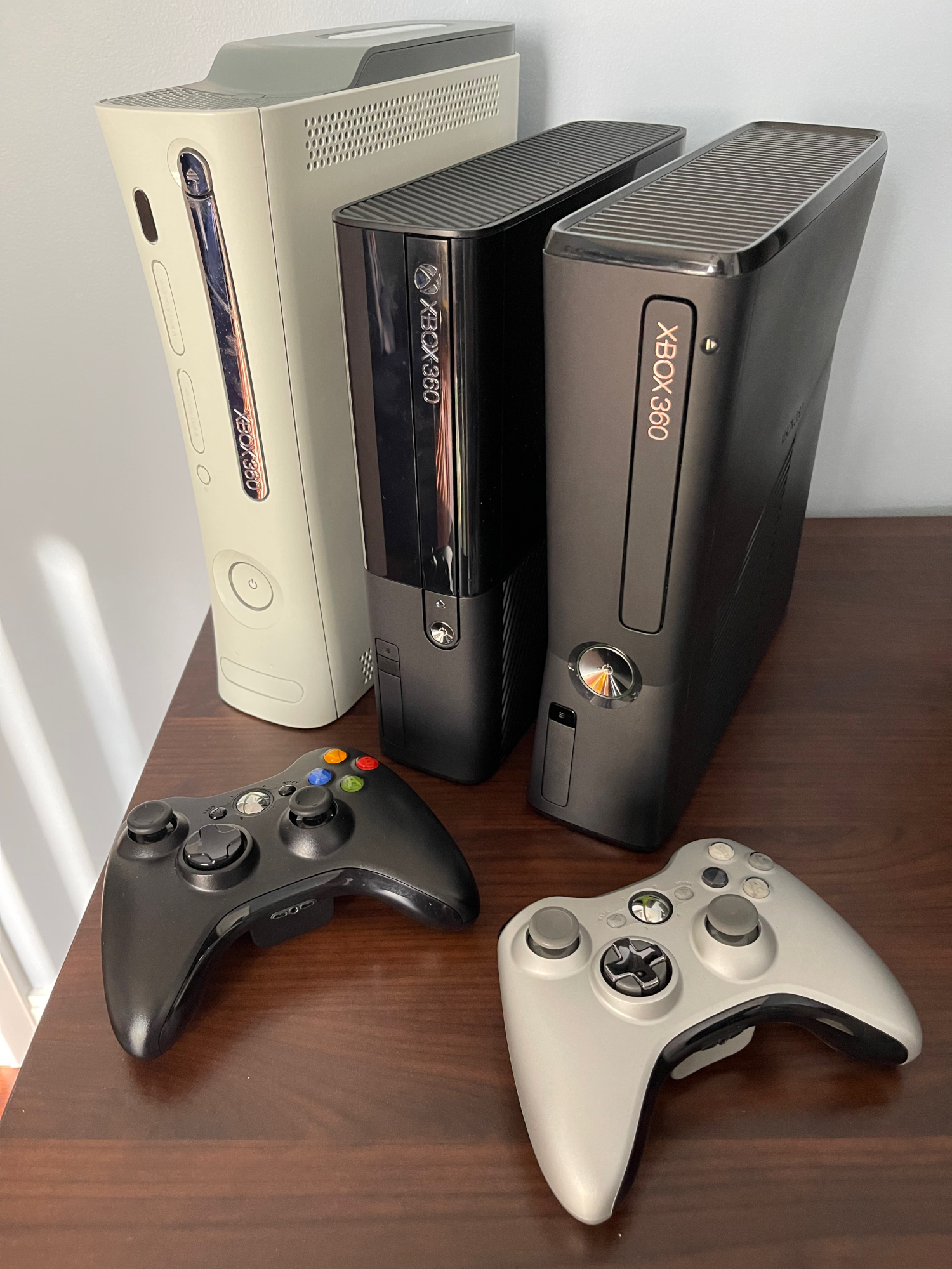 My Xbox 360 consoles from over the years. Xbox 360 (Original), Xbox 360 E and the Xbox 360 Slim.