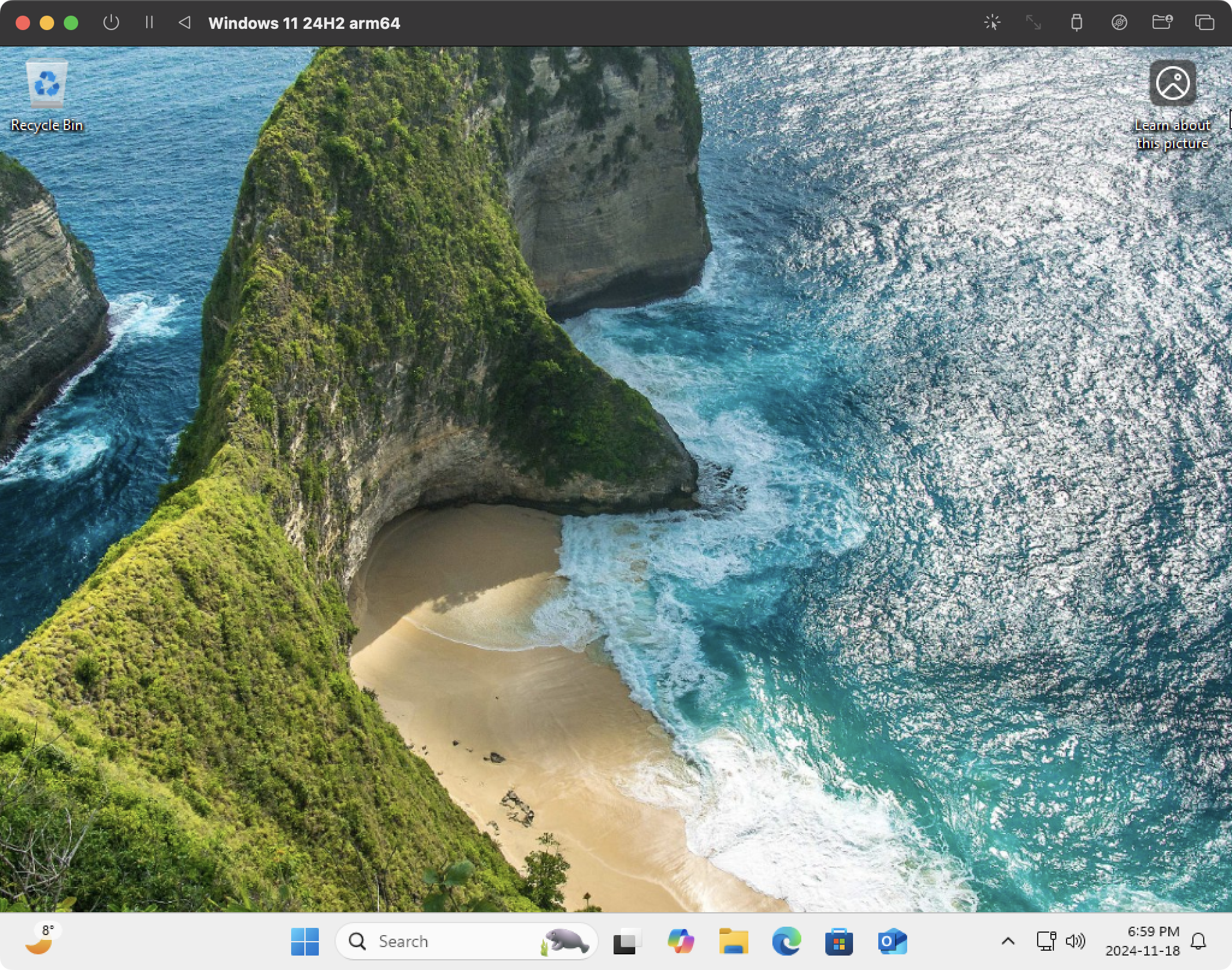 The default desktop for Windows 11 24H2 running on UTM 4.5.4.